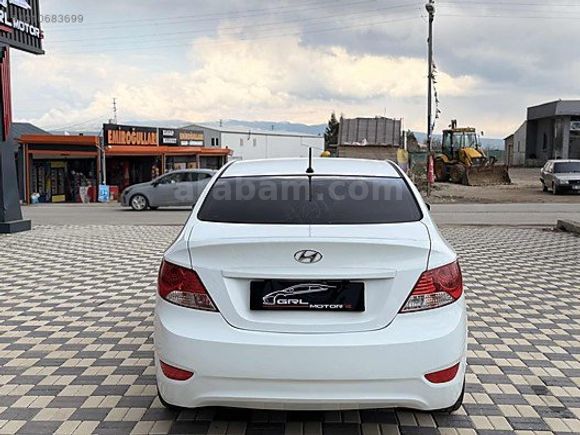 GRL MOTORS'TAN 88.000 ACCENT BLUE