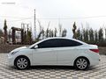 GRL MOTORS'TAN 88.000 ACCENT BLUE