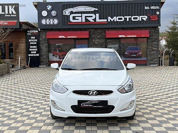 GRL MOTORS'TAN 88.000 ACCENT BLUE