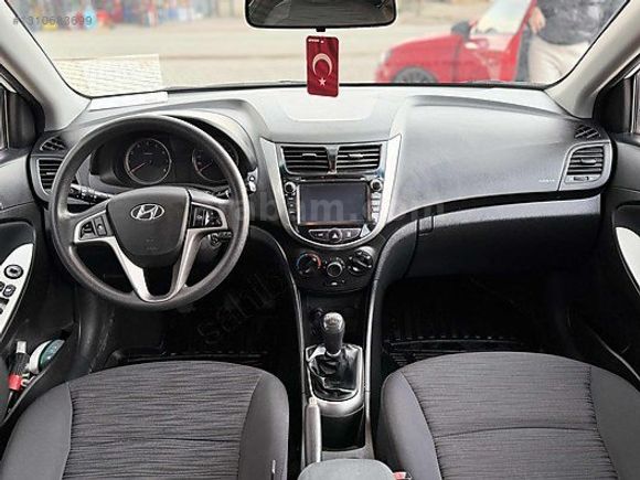 GRL MOTORS'TAN 88.000 ACCENT BLUE