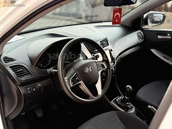 GRL MOTORS'TAN 88.000 ACCENT BLUE