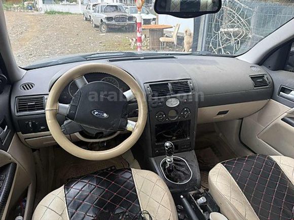 FORD MONDEO 2.0 GHİA MOTORDA TEKLEME VAR