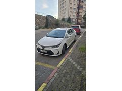 Sahibinden boyasız değişensiz tramersiz Memurdan Toyota Corolla 1.8 Hybrid Dream 2020 Model Kocaeli 102000 km Beyaz
