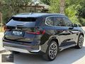 2024 İX1 eDRIVE20 C.TAVAN MOCHA DERİ E.BAGAJ JANT BOYASIZ BAYİİ