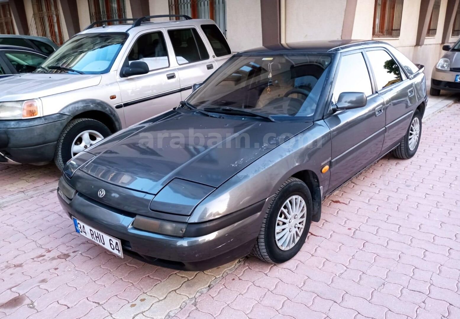 ミンタビ Sahibinden Mazda 323 1.6 Familia 1993 Model Konya 340.000 km Füme