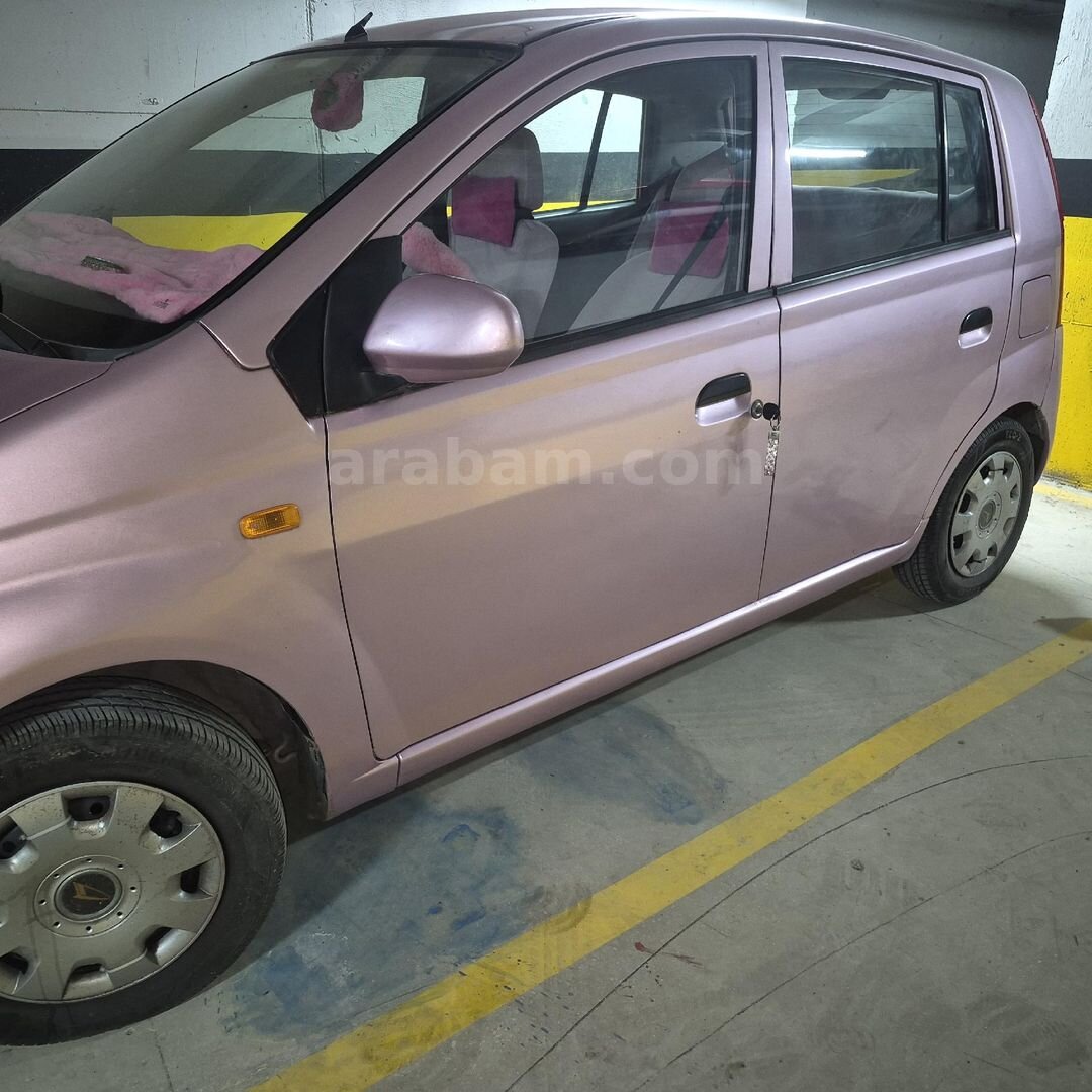 Sahibinden Daihatsu Cuore 1.0 Low Grade 2005 Model İstanbul 195.000 km Pembe 3