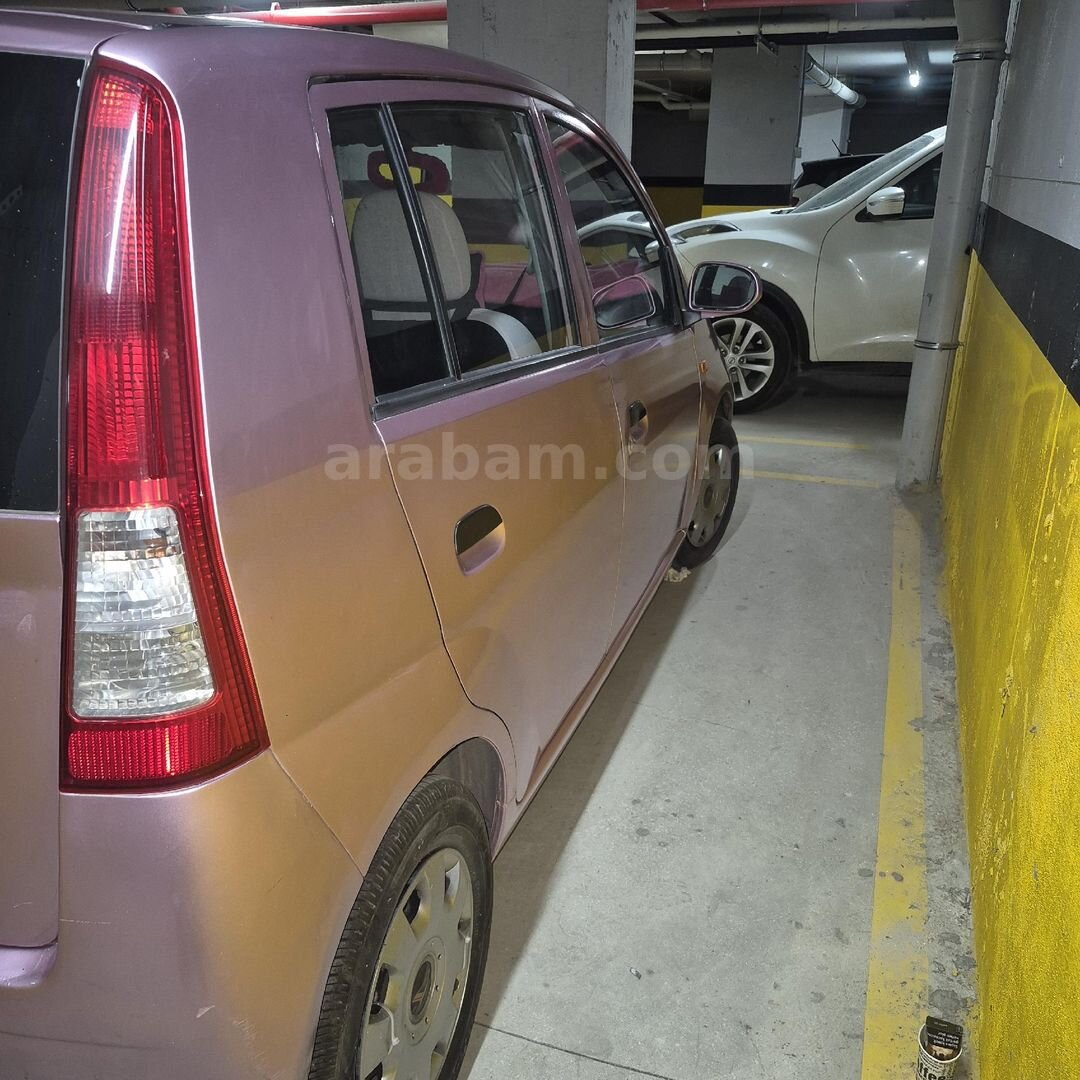 Sahibinden Daihatsu Cuore 1.0 Low Grade 2005 Model İstanbul 195.000 km Pembe 4