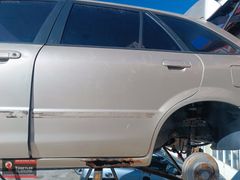 TÜNEYLER 'DEN MAZDA 323 SOL ARKA KAPI