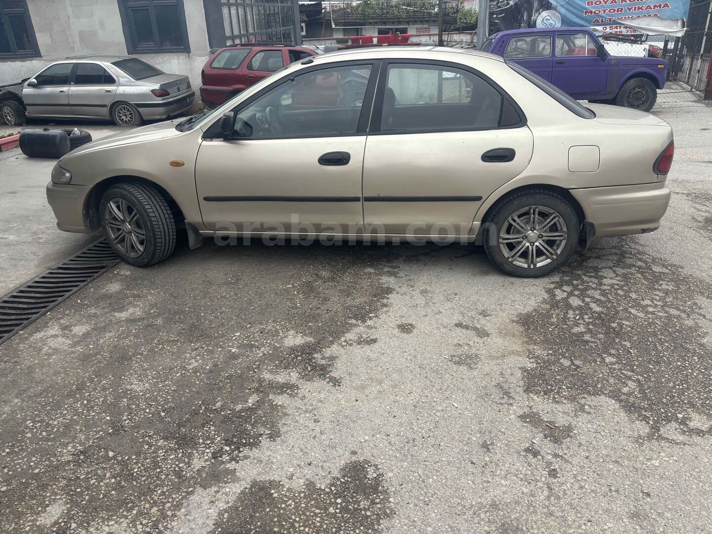Sahibinden Mazda 323 1.8 GLX 1998 Model Karabük 300.000 km Şampanya 2