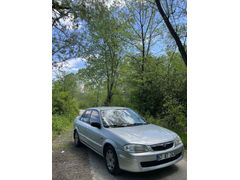 SAHİBİNDEN MAZDA 323 YENİ VİZELİ