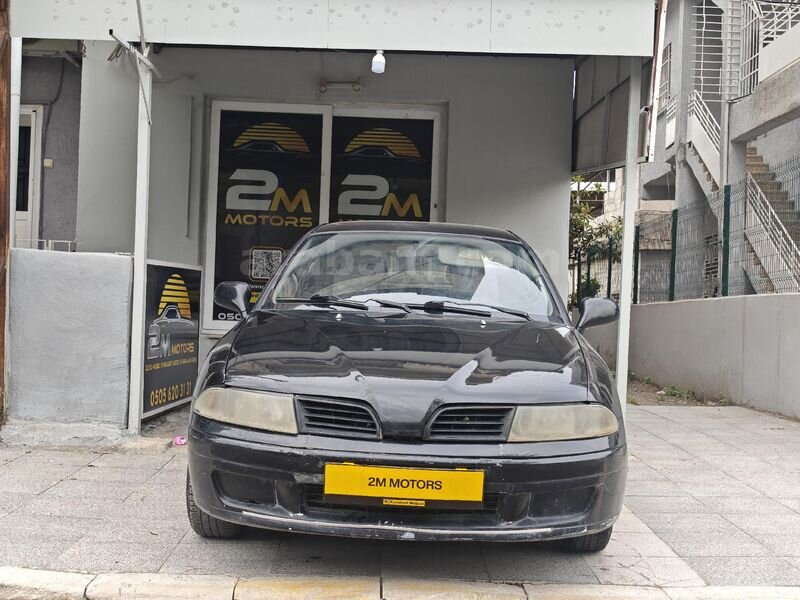 Galeriden Mitsubishi Carisma 1.6 Comfort 2003 Model Hatay 308.000 km Siyah