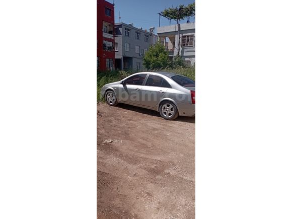 forklifciden  Nissan Primera 1.6 Tekna 2004 Model 45 grm adana burma bilezik ile takas olur
