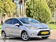 AÇIKEL AUTO CENTER-TİTANYUM-235.000 KM-FİESTA-FULL