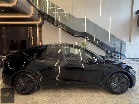 AĞABEY'DEN 2025 TESLA MODEL Y PREMİUM (JUNİPER)-OTOPLT-HATSZ