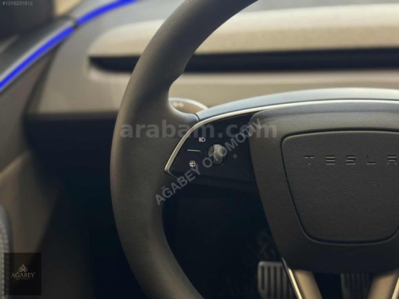 AĞABEY'DEN 2025 TESLA MODEL Y PREMİUM (JUNİPER)-OTOPLT-HATSZ