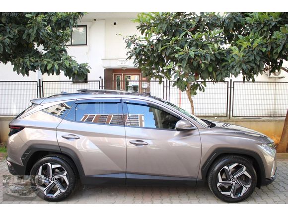 2022_HYUNDAİ_TUSCON_1,6 CRDİ_ELİT PLUS_4X4_38,000KM DE