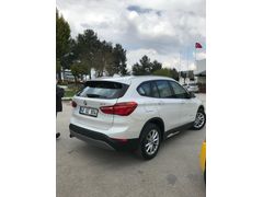 Sahibinden BMW X1 18i sDrive X Line 2015 Model  90.000 km Beyaz. Prince LPG mevcut.