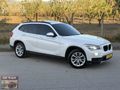 ÖZKAR'DAN 2014 BMW X1 16i SDRİVE CAM TAVANLI 155.000 KM