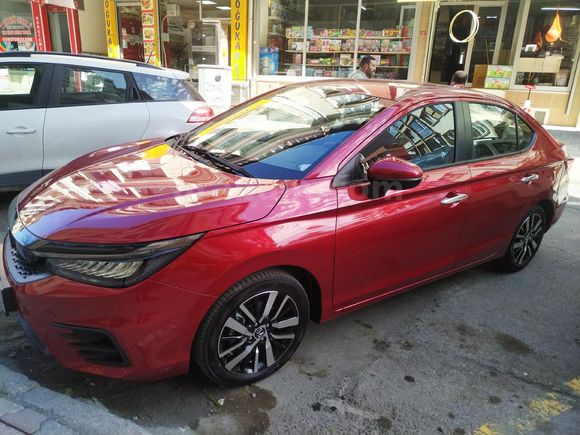 Honda City 1.5 i-VTEC Executive. 2024  , MAYIS AYİNDA SIFIR KM ALDIM.      2023,Model  27.000 km Kırmızı