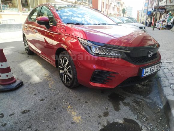 Honda City 1.5 i-VTEC Executive. 2024  , MAYIS AYİNDA SIFIR KM ALDIM.      2023,Model  27.000 km Kırmızı