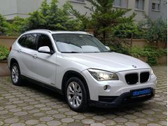 OTOMOBİLCİ 2013 BMW X1 1.6sDrive Sport Line-RECARO-NBT-CAM TAVAN