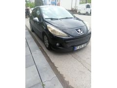 Sahibinden Peugeot 207 1.4 HDi Millesim 2010 Model  298.000 km siyah ı