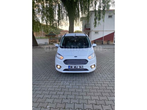 OTOMOBİL RUHSATLI 65 KM  DE HATSIZ BOAYSIZ Titanium Plus TUTULANI   