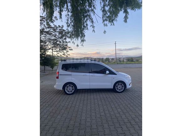 OTOMOBİL RUHSATLI 65 KM  DE HATSIZ BOAYSIZ Titanium Plus TUTULANI   