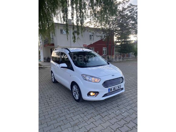 OTOMOBİL RUHSATLI 65 KM  DE HATSIZ BOAYSIZ Titanium Plus TUTULANI   