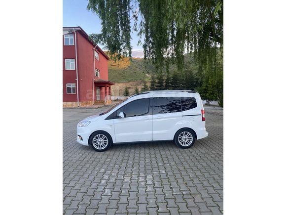 OTOMOBİL RUHSATLI 65 KM  DE HATSIZ BOAYSIZ Titanium Plus TUTULANI   