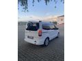 OTOMOBİL RUHSATLI 65 KM  DE HATSIZ BOAYSIZ Titanium Plus TUTULANI   