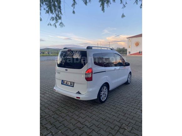 OTOMOBİL RUHSATLI 65 KM  DE HATSIZ BOAYSIZ Titanium Plus TUTULANI   