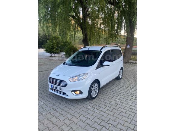 OTOMOBİL RUHSATLI 65 KM  DE HATSIZ BOAYSIZ Titanium Plus TUTULANI   