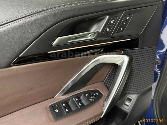 NEVKOR AUTO'DAN 2024 MODEL İX1 eDRIVE20 TABA- CAM TAVAN 42.000KM