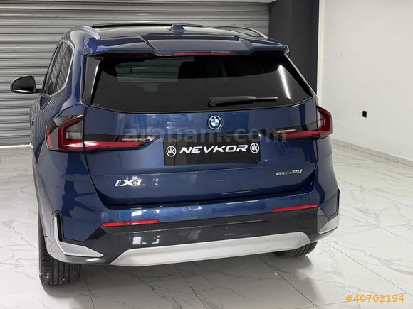 NEVKOR AUTO'DAN 2024 MODEL İX1 eDRIVE20 TABA- CAM TAVAN 42.000KM