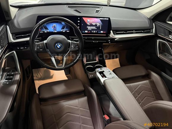 NEVKOR AUTO'DAN 2024 MODEL İX1 eDRIVE20 TABA- CAM TAVAN 42.000KM