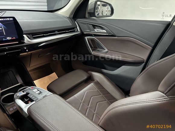 NEVKOR AUTO'DAN 2024 MODEL İX1 eDRIVE20 TABA- CAM TAVAN 42.000KM