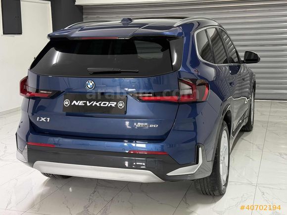NEVKOR AUTO'DAN 2024 MODEL İX1 eDRIVE20 TABA- CAM TAVAN 42.000KM