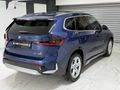 NEVKOR AUTO'DAN 2024 MODEL İX1 eDRIVE20 TABA- CAM TAVAN 42.000KM