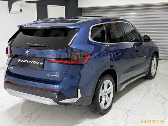 NEVKOR AUTO'DAN 2024 MODEL İX1 eDRIVE20 TABA- CAM TAVAN 42.000KM
