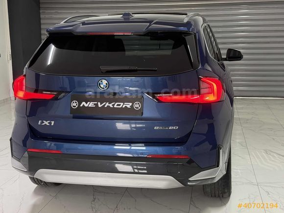 NEVKOR AUTO'DAN 2024 MODEL İX1 eDRIVE20 TABA- CAM TAVAN 42.000KM