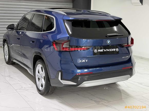 NEVKOR AUTO'DAN 2024 MODEL İX1 eDRIVE20 TABA- CAM TAVAN 42.000KM