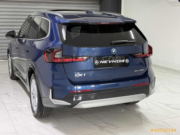 NEVKOR AUTO'DAN 2024 MODEL İX1 eDRIVE20 TABA- CAM TAVAN 42.000KM