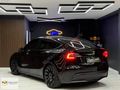 MURATOĞLU__2023 TESLA MODEL Y PERFORMANCE 4ÇEKER 534HP BOYASIZ
