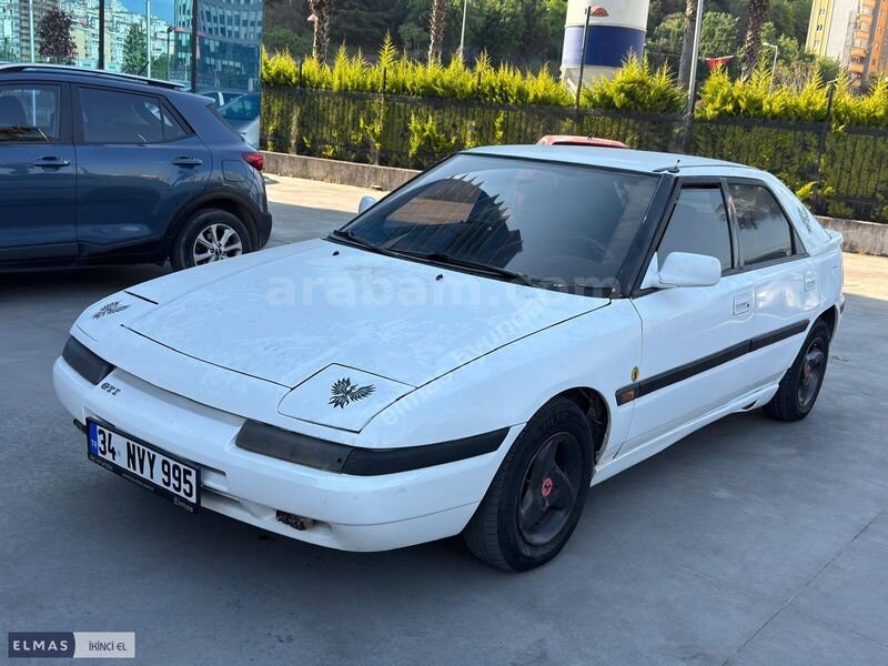 Galeriden Mazda 323 1.3 1992 Model İstanbul 203.000 km Beyaz