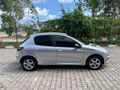 E.S OTOMOTİVDEN 206+4 KAPI+KLİMALI