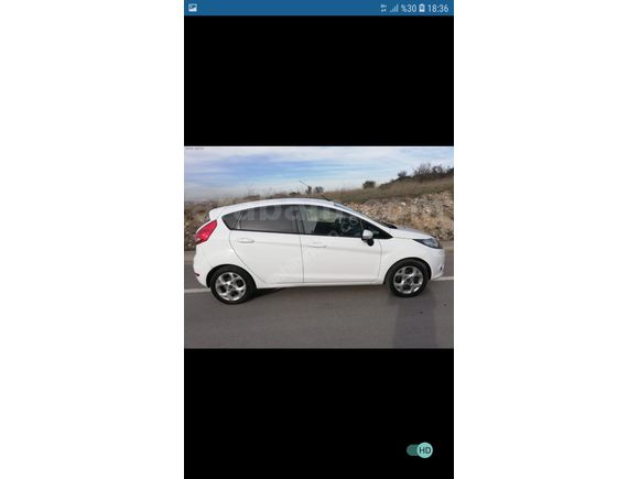 Memurdan temiz, değişensiz, hasar kayıtsız, 2 parça lokal boyalı, ağır bakımları yapılmış, masrafsız 2012 ford fiesta, fiyat düştü ilk gelen alır