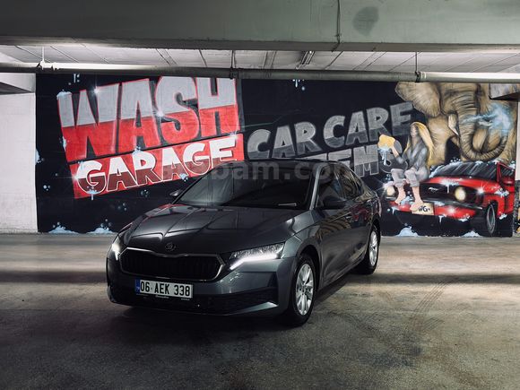 YARGI MENSUBUNDAN HATASIZ-BOYASIZ-TRAMERSİZ KAPALI GARAJDA MUHAFAZA EDİLMİŞ SKODA OCTAVİA