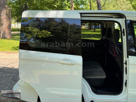 ŞENTÜRK'TEN 2023 OTOMOBİL COURİER TİTANİUM CAMLI VAN 30DK KREDİ