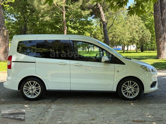 ŞENTÜRK'TEN 2023 OTOMOBİL COURİER TİTANİUM CAMLI VAN 30DK KREDİ